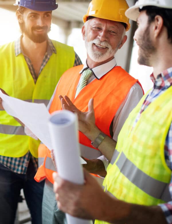 confident-team-of-architects-and-engineers-working